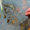 hand-painting-the-leaves-and-removing-the-silver-ready-for-gilding